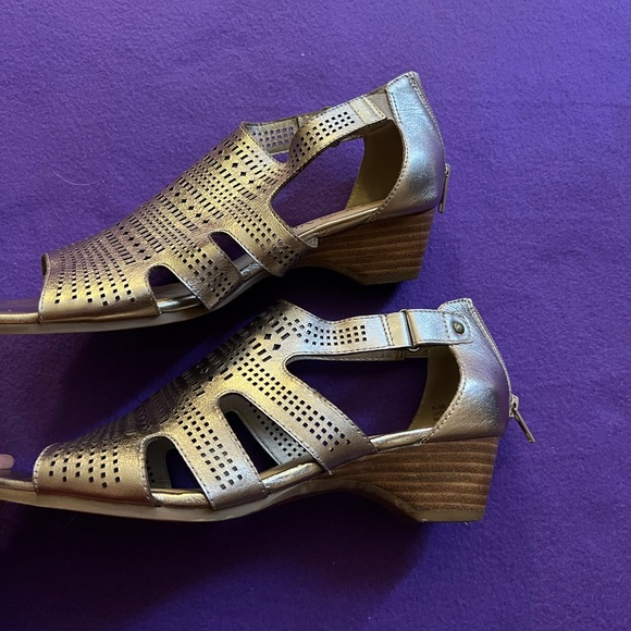 Gold sandals with small wedge heel.  Zips in back.  Size 8.5 - Picture 3 of 5